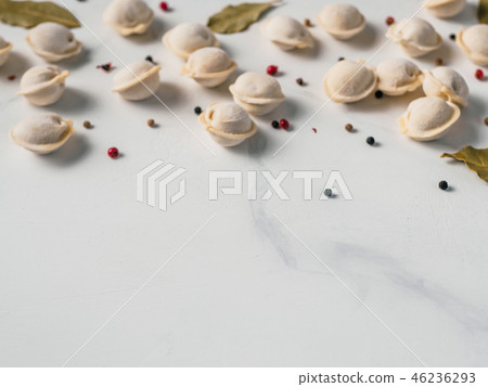 scattered frozen pelmeni top view, copy space scattered frozen pelmeni top view, copy space 46236293