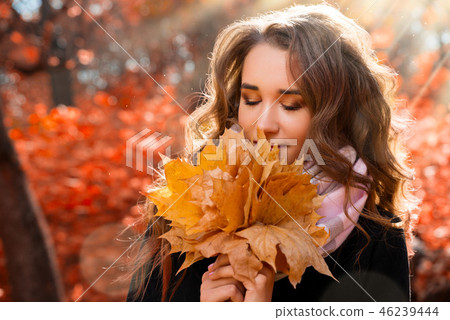 Girl in autumn forest Girl in autumn forest 46239444