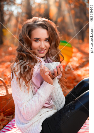 Girl in autumn forest Girl in autumn forest 46239445