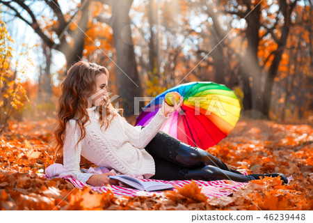 Girl in autumn forest 46239448