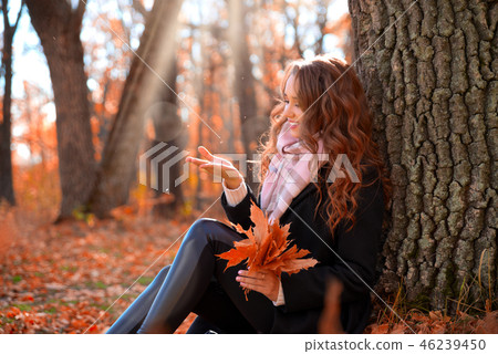 Girl in autumn forest Girl in autumn forest 46239450