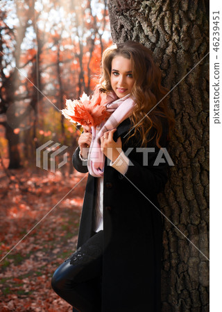 Girl in autumn forest Girl in autumn forest 46239451