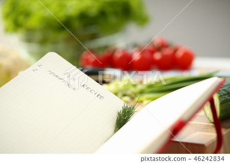 An open book of recipes on background An open book of recipes on background 46242834
