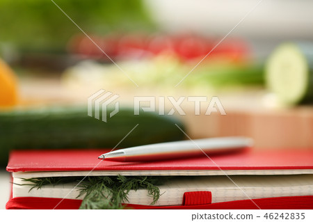 An open book of recipes on background An open book of recipes on background 46242835