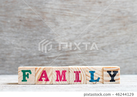 Letter block in word family on wood background Letter block in word family on wood background 46244129