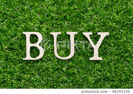 Wood alphabet in word buy on green grass Wood alphabet in word buy on green grass 46244130
