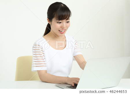Rejoice woman looking at the screen Rejoice woman looking at the screen 46244653
