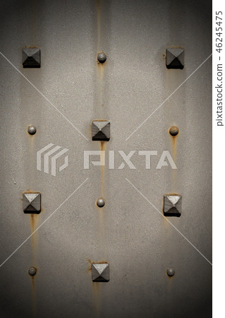 Metal Door with Pyramidal Studs - Background 46245475