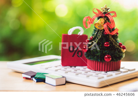 A beautifully decorated Christmas tree placed A beautifully decorated Christmas tree placed 46245606