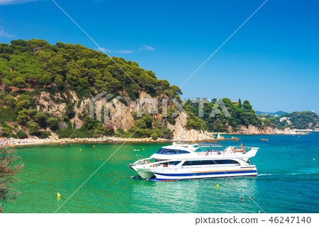 White tourists yacht swims in spanish resort 46247140