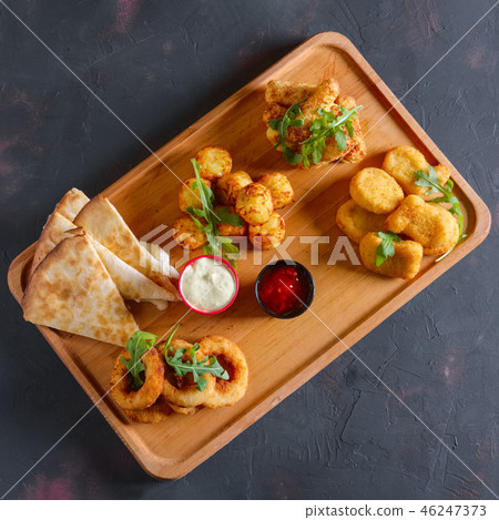 Wooden plate with snack for beer Wooden plate with snack for beer 46247373