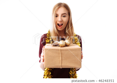 Cheerful girl in the hat of Santa Claus looking 46248351