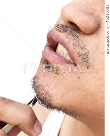 man pull mustache by tweezers on white background 46250583