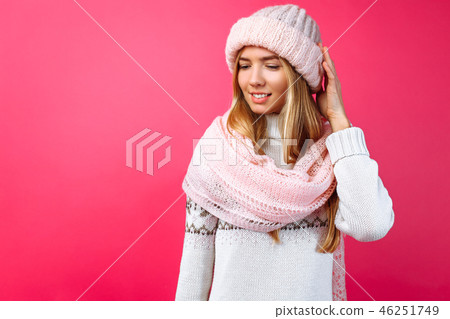 Beautiful girl standing isolated on red background 46251749