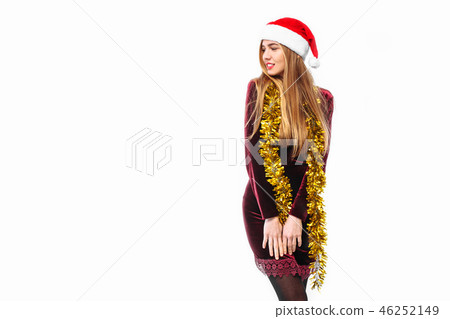 woman in santa hat and dress  new year  46252149