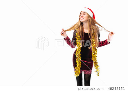 woman in santa hat and dress celebrating new year woman in santa hat and dress celebrating new year 46252151