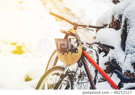 Full face helmet hangs on the bicycle handlebars 46252527