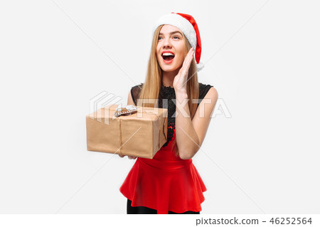 Shocked woman in a dress and Santa Claus Shocked woman in a dress and Santa Claus 46252564
