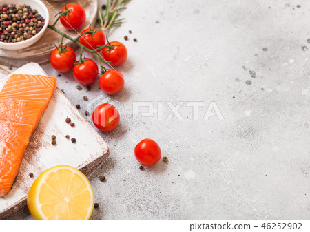 Fresh raw salmon slice on chopping board Fresh raw salmon slice on chopping board 46252902
