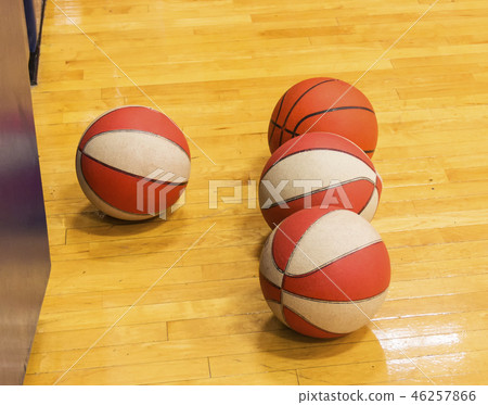 Basketballs on gym floor Basketballs on gym floor 46257866
