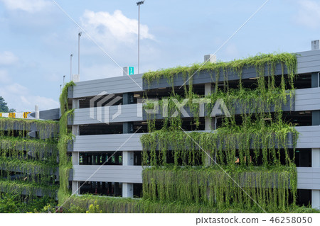 Modern parking garage building covered with plant, Modern parking garage building covered with plant, 46258050