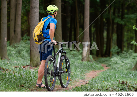 Cyclist in forest park 46261606