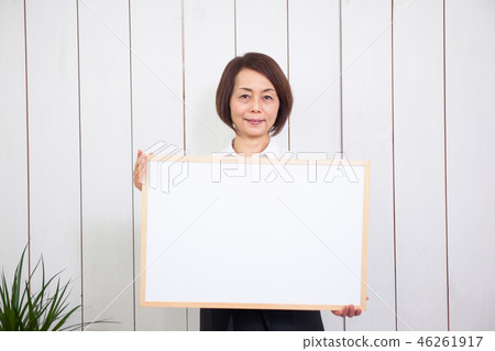 Cafe clerk with board 46261917