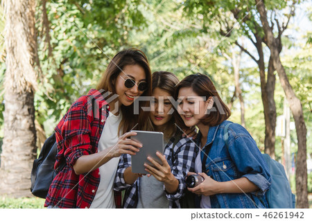 women using camera while travel in Thailand. women using camera while travel in Thailand. 46261942