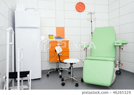 Modern and comfortable equipped hospital room. Treatment room with medicine in the fridge. 46265329