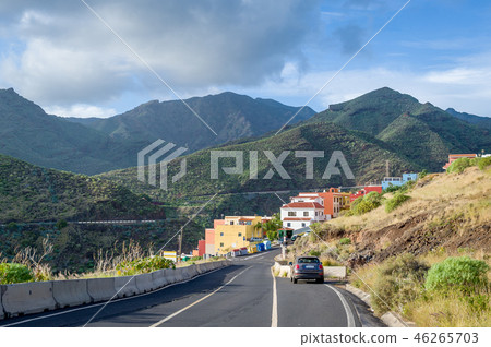 Rural road of Tenerife island and bautiful mountain view at the background Rural road of Tenerife island and bautiful mountain view at the background 46265703