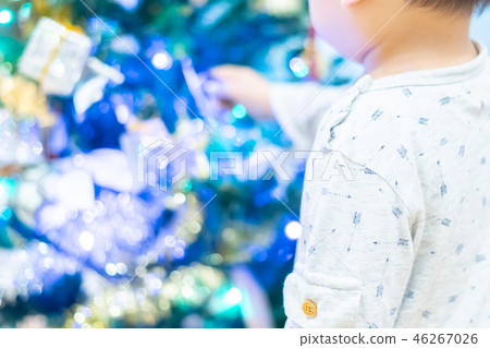Christmas image Children decorating a Christmas tree 46267026