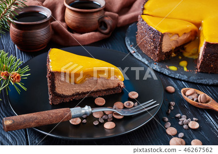 a piece of a cake on a black plate a piece of a cake on a black plate 46267562