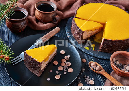 a piece of a cake on a black plate a piece of a cake on a black plate 46267564
