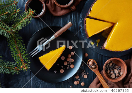 chocolate mango cheesecake on a plate chocolate mango cheesecake on a plate 46267565