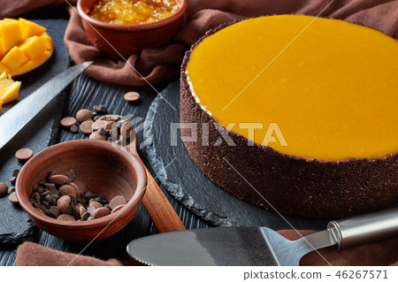 tasty chocolate mango cheesecake, close up tasty chocolate mango cheesecake, close up 46267571