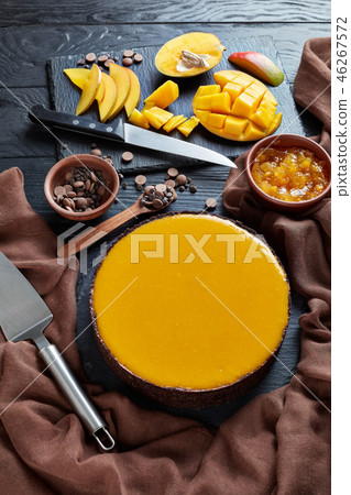 tasty chocolate mango cheesecake, close up tasty chocolate mango cheesecake, close up 46267572