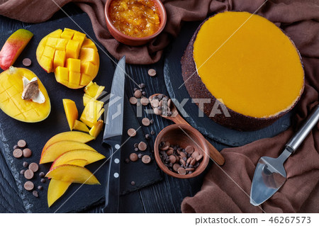 tasty chocolate mango cheesecake, close up 46267573
