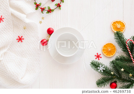 Christmas composition with empty white cup and decorations 46269738