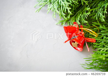 Christmas background with xmas fir branches and red bells. 46269739