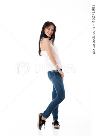 young woman is jumping on a white background 46271992