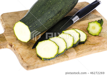 Zucchini on kitchen cutting board, sliced Zucchini on kitchen cutting board, sliced 46272269
