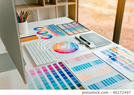 Designer's equipment is placed on the desk. Designer's equipment is placed on the desk. 46272497