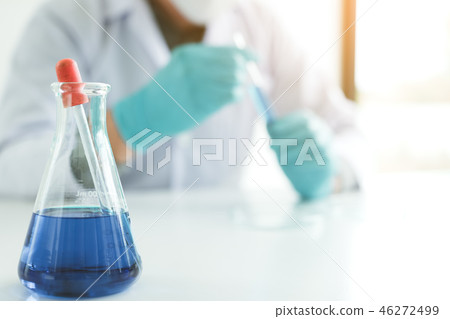 Close up chemical glass tube on table in lab Close up chemical glass tube on table in lab 46272499