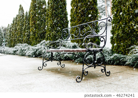 A Park bench covered with snow. Snow, 46274241