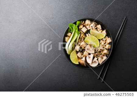 Tofu asian vegetarian soup served in bowl 46275503