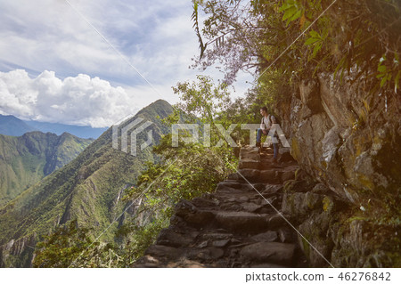 Man stand on road cliff Man stand on road cliff 46276842