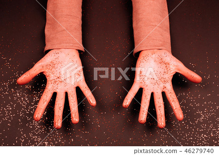 Manicure with glittering Living Coral fingers. Manicure with glittering Living Coral fingers. 46279740