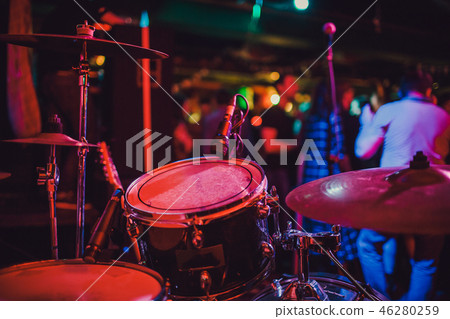 Drum kit on stage in the spotlight color. 46280259