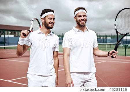 Business, partnership and sport. Business partners practicing sport together. Young men walking and 46281116