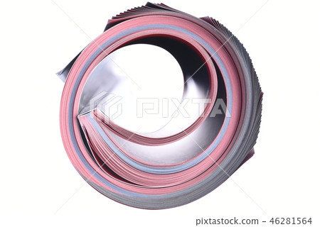Rolled magazine isolated on white background 46281564